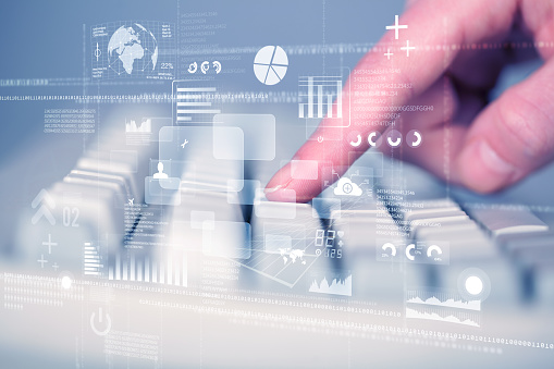 Keyboard buttons pressed by hand with high tech icons and symbols